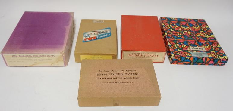 LOT OF 5 JOSEPH K. STRAUS WOOD JIGSAW PUZZLES: LOT OF FIVE JOSEPH K. STRAUS WOOD JIGSAW PUZZLES *FISHERFOLK BY GOODAL*THE LINDBERGH TAPESTRY* *THE BEACH AT ST ADRESSE* *MAP OF THE UNITED STATES* & *PARIS* NUMBER OF PIECES IS UNCERTAIN