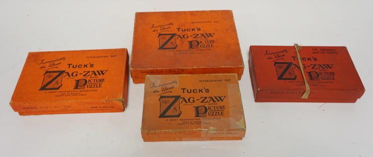 LOT OF FOUR WOOD JIGSAW PUZZLES BY TUCKS *ZAG-ZAW*: LOT OF FOUR WOOD JIGSAW PUZZLES BY TUCKS *ZAG-ZAW* IN ORIGINAL BOXES. NUMBER OF PIECES IS UNCERTAIN