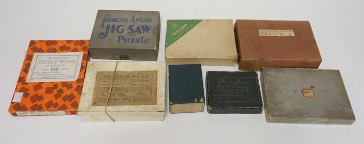 LOT OF 8 MISC. WOOD JIGSAW PUZZLES MISC MAKERS: LOT OF EIGHT MISC. WOOD JIGSAW PUZZLES INCLUDING ONE BY GLOBE PUZZLE COMPANY TITLED *A WINTERS MORNING* A PUZZLE GRAM FROM F.A.O SCHWARZ & ONE FROM SAM & GABRIEL SONS COMPANY TITLED *SUMMER IN NORMAND