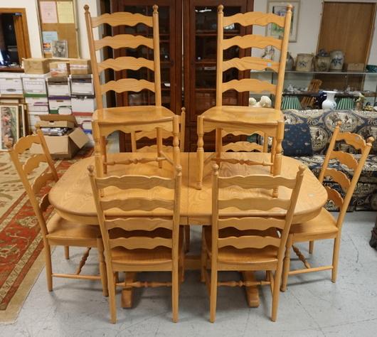 COUNTRY OAK DINING ROOM 9 PIECE SET: COUNTRY OAK DINING ROOM SET WITH OVAL 68 IN X 42 IN TABLE AND 2 LEAVES 14 IN EACH WITH 8 LADDER BACK CHAIRS
