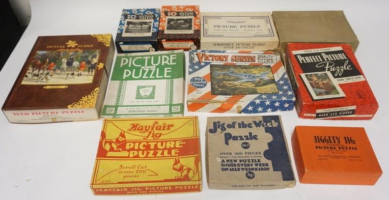 LOT OF 11 PUZZLES: LOT OF 11 PUZZLES INCLUDING, VICTORY SERIES, WEEKLY PICTURE PUZZLE BY VIKING MANUFACTURING COMPANY INC. TWO BY BIG 10, ONE BY MAYFAIR JIG PICTURE PUZZLE & ONE BY SCHOENUT. NUMBER OF PIECES IS UNCERTIA