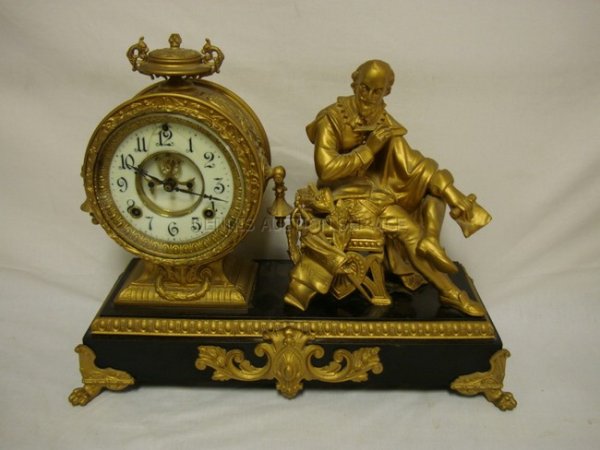SHAKESPEARE FIGURAL METAL MANTLE CLOCK, ANSONIA; : SHAKESPEARE FIGURAL METAL MANTLE CLOCK, ANSONIA; SOME HAIRLINES IN THE FACE; 17 1/2 IN W, 14 IN H, 7 1/2 IN D