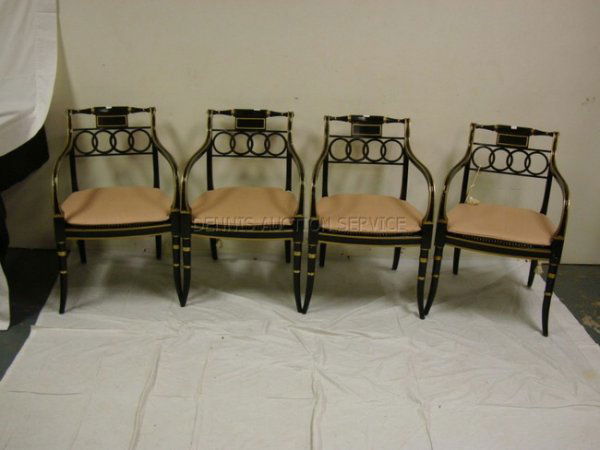 SET OF 4 BAKER ARM CHAIRS; INTERLOCKING CIRCLE BA: SET OF 4 BAKER ARM CHAIRS; INTERLOCKING CIRCLE BACKS, PTD BLACK & GOLD, CONE SEATS; HAVE CUSHIONS; 33 IN H, 21 1/2 IN W