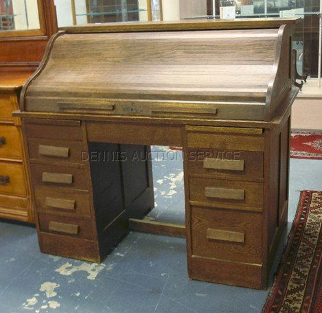 OAK S-ROLL TOP DESK; HAS 2 PULL OUT SURFACES; 49: OAK S-ROLL TOP DESK; HAS 2 PULL OUT SURFACES; 49 IN W, 44 IN H, 29 1/4 IN D