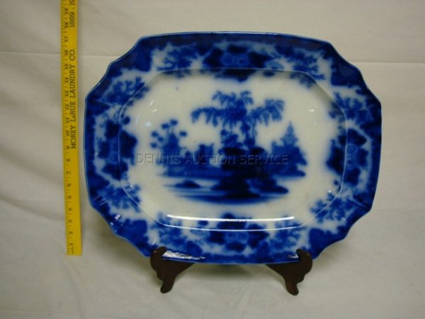 SCINDE LARGE FLOW BLUE PLATTER; HAS IMPRESSED MAK: SCINDE LARGE FLOW BLUE PLATTER; HAS IMPRESSED MAKERS MARK, ALCOCK; 20 1/4 IN X 16 IN