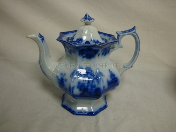 SCINDE PATTERN FLOW BLUE TEAPOT; HAS A CHIP IN TH: SCINDE PATTERN FLOW BLUE TEAPOT; HAS A CHIP IN THE DECORATION THAT HAS BEEN GLUED IN; 9 IN H