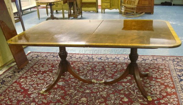 KITTINGER BANDED MAHOGANY DINING TABLE W/3 LEAVES: KITTINGER BANDED MAHOGANY DINING TABLE W/3 LEAVES; HAS HAND WRITTEN SERIAL & PATTERN NUMBERS; 72 IN X 47 3/4 IN, 29 1/2 IN H; LEAVES ARE 12 IN