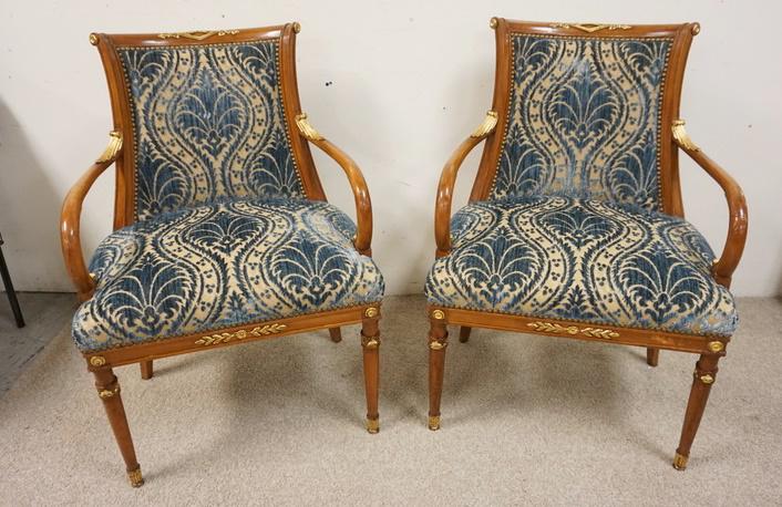 PAIR OF UPHOLSTERED CARVED ARM CHAIRS: PAIR OF UPHOLSTERED CARVED ARM CHAIRS W/GILT WOOD ACCENTS, 23 1/2 IN WIDE X APPROXIMATELY 21 IN DEEP X 35 IN HIGH W/SEAT HEIGHT OF 21 IN