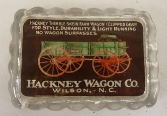 ANTIQUE GLASS PAPERWEIGHT HACKNEY WAGON CO: ANTIQUE GLASS PAPERWEIGHT HACKNEY WAGON CO WILSON NC, 4 1/2 IN X 3 1/4 IN X 3 1/4 IN