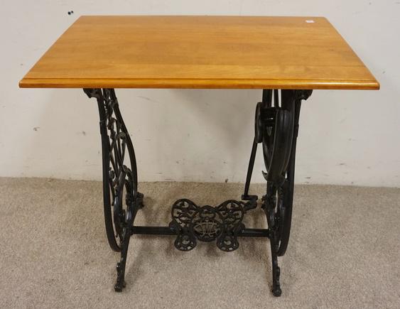 TABLE W/CAST IRON TREADLE SEWING MACHINE BASE: TABLE W/CAST IRON TREADLE SEWING MACHINE BASE, 27 1/2 IN X 16 3/4 IN X 29 1/2 IN HIGH