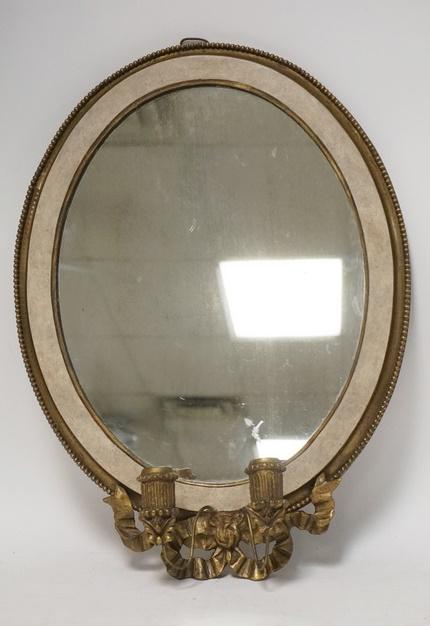 OVAL MIRROR W/ 2 BRASS CANDLE HOLDER: OVAL MIRROR W/ TWO BRASS CANDLE HOLDERS 17 1/4 IN X 23 1/2 IN