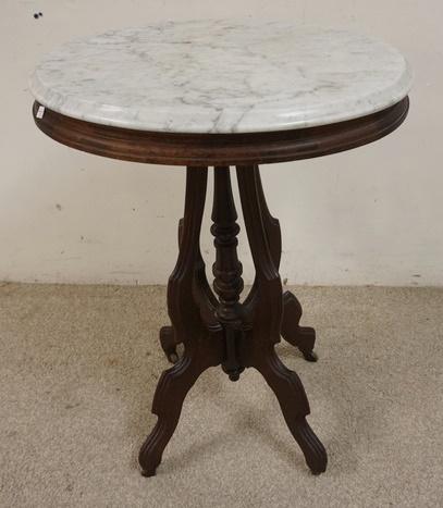 OVAL WALNUT MARBLE TOP TABLE: OVAL WALNUT MARBLE TOP TABLE 22 IN X 16 1/2 IN 30 1/4 IN H