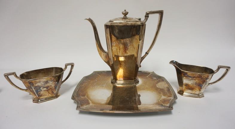 HOMAN 4 PIECE SILVER PLATED TEA SET: HOMAN 4 PIECE SILVER PLATED TEA SET, POT IS 8 1/4 IN HIGH