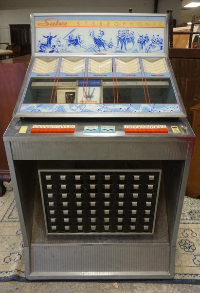 SEEBURG STEREO JUKE BOX: SEEBURG STEREO JUKEBOX MODEL Q 100 SR. COMES W/ INSTALLATION MANUAL & TWO BOXES OF 45 RPM RECORDS