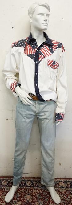 MALE MANNEQUIN CLOTHED: MALE MANNEQUIN CLOTHED WITH LEVI JEANS AND VINTAGE WILD WEST DESIGN SHIRT MADE IN TEXAS, LEATHER BELT. MANNEQUIN IS APPROXIMATELY 72 IN TALL. MANNEQUIN SOLD AS IS MAY HAVE LOSSES.