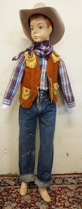 YOUNG BOY MANNEQUIN CLOTHED VINTAGE SELVEDGE BIG E: YOUNG BOY MANNEQUIN CLOTHED VINTAGE SELVEDGE BIG E JEANS, DECORATED VEST, LEVIS WESTERN SHIRT, BANDANNA AND TWISTER BAILEY WEST HAT. MANNEQUIN IS APPROXIMATELY 54 IN TALL AND HAS NO ARMS . MANNEQUIN S