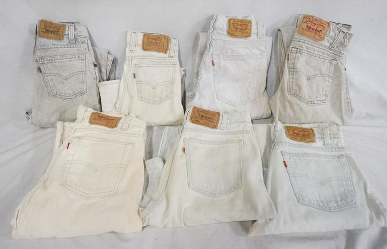 LOT OF 7 PAIRS OF VINTAGE USA MADE LEVIS JEANS: LOT OF SEVEN PAIRS OF VINTAGE USA MADE LEVI STRAUSS & COMPANY JEANS. TWO ARE YOUTH SIZES 12 & 11, THE OTHERS HAVE 27, 30 & 32 IN WAIST SIZES. VARYING DEGREES OF WEAR