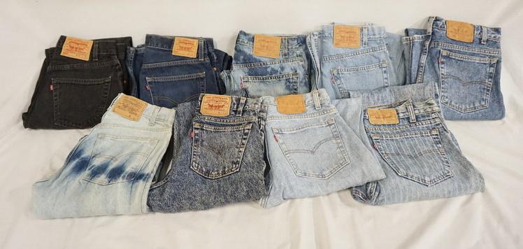 LOT OF 9 PAIRS OF VINTAGE USA MADE LEVI'S JEANS W/ RED: LOT OF NINE PAIRS OF VINTAGE USA MADE LEVI STRAUSS & COMPANY JEANS W/ RED TABS. SIZES ARE; 33 X 32, 32 X 30, 33 X 30, 31 X 30, 31 X 34, & THREE PAIRS ARE SIZE 32 X 32. VARYING DEGREES OF WEAR