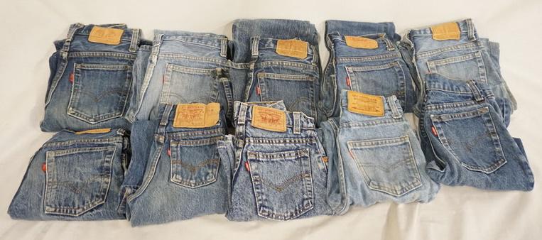 LOT OF 10 PAIRS OF VINTAGE LEVI'S JEANS W/ RED TAB: LOT OF TEN PAIRS OF LEVI STRAUSS & COMPANY JEANS W/ RED TABS. ALL ARE YOUTH SIZES; 10, 14, 7, 9, THTEE PAIRS SIZE 12, THREE PAIRS THE SIZES ARE MISSING. VARYING DEGREES OF WEAR