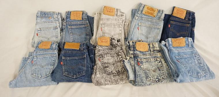 LOT OF 10 PAIRS OF VINTAGE LEVIS JEANS W/ RED TAB: LOT OF TEN PAIRS OF VINTAGE USA LEVI STRAUSS & COMPANY JEANS W/ RED TABS. ALL ARE YOUTH SIZES. TWO SIZES ARE UNKNOWN, THREE ARE SIZE 12, THE REST ARE SIZES; 9, 8, 10, 7 & 11. VARYING DEGREES OF WEAR