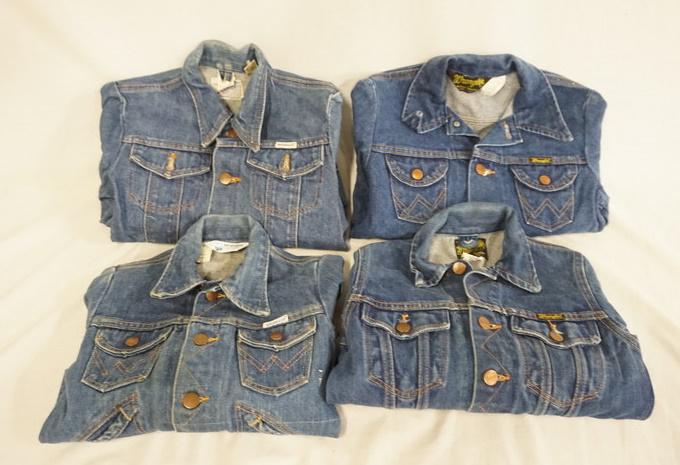 LOT OF 4 VINTAGE WRANGLER DENIM JACKETS: LOT OF FOUR VINTAGE WRANGLER DENIM JACKETS, ALL ARE MARKED MADE IN USA. SIZES ARE; 10, 8, 14, ONE SIZE UNMARKED MEASURES APP. 14 IN SHOULDER TO SHOULDER. VARYING DEGREES OF WEAR