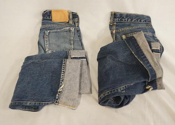 LOT OF 2 PAIRS OF VINTAGE LEVI SELVEDGE JEANS: LOT OF TWO PAIRS OF VINTAGE LEVI STRAUSS & COMPANY SELVEDGE JEANS. MEASURES APP. 23 X 24 & 28 X 24. VARYING DEGREES OF WEAR