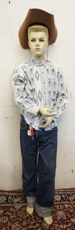 BOY MANNEQUIN CLOTHED IN VINTAGE LEVIS SELVEDGE JEANS: BOY MANNEQUIN CLOTHED IN VINTAGE LEVI STRAUSS & COMPANY SELVEDGE JEANS. MANNEQUIN IS APP. 57 IN TALL & IS ALSO WEARING A BUGLE BOY SHIRT, A SADDLE TIE CLIP & AN *ALWAYS ON TOP* WESTERN RANMAN COWBOY H
