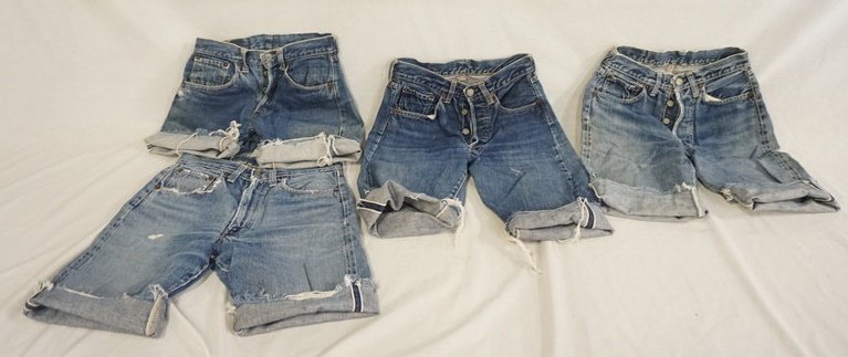 LOT OF 4 PAIRS OF VINTAGE LEVIS SELVEDGE JEANS CUT INTO: LOT OF FOUR PAIRS OF VINTAGE LEVIS SELVEDGE JEANS THAT HAVE BEEN CUT INTO SHORTS. ONE PAIR WAIST SIZE IS MARKED 28. THE OTHER THREE MEASURE APP. 26, 27 & 28 IN WAIST
