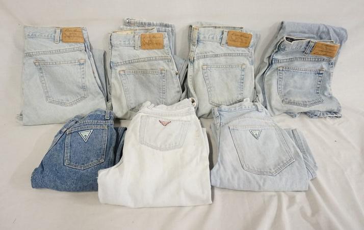 LOT OF 7 PAIRS OF JEANS; GUESS & EDDIE BAUER: LOT OF SEVEN PAIRS OF JEANS THREE ARE GUESS & FOUR ARE EDDIE BAUER. ALL JEANS EXCEPT ONE PAIR OF EDDIE BAUER JEANS (MARKED MADE IN MEXICO) ARE MARKED MADE IN USA. SIZES OF GUESS ARE MARKED; 27, 31 & 1