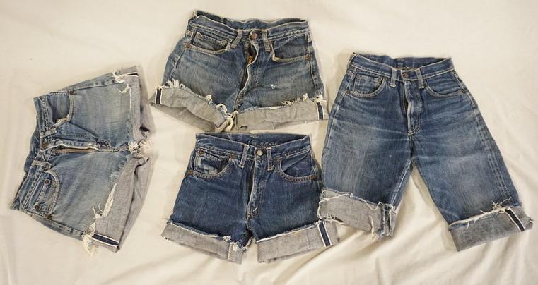 LOT OF 4 PAIRS OF VINTAGE LEVIS SELVEDGE JEANS CUT INTO: LOT OF FOUR PAIRS OF VINTAGE LEVIS SELVEDGE JEANS THAT HAVE BEEN CUT INTO SHORTS. APP. WAIST MEASUREMENTS ARE 27 IN, 26 IN, & TWO ARE 24 IN. VARYING DEGREES OF WEAR