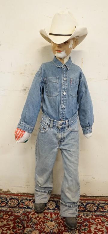 YOUNG BOY MANNEQUIN CLOTHED IN VINTAGE LEVIS: YOUNG BOY MANNEQUIN CLOTHED IN VINTAGE LEVIS JEANS & LEVIS SHIRT, COWBOY BOOTS & COWBOY HAT. HAS NO ARMS & LOSSES TO FACE/HEAD. APP. 47 IN TALL