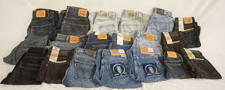 LOT OF 19 PAIRS OF SHORTS: LOT OF 19 PAIRS OF SHORTS. ALL BUT ONE (WRANGLER) ARE LEVIS. LOT INCLUDES BOTH ADULT & YOUTH SIZES. LOT ALSO INLCUDES THREE PAIRS OF SILVER TAB LEVIS SHORTS