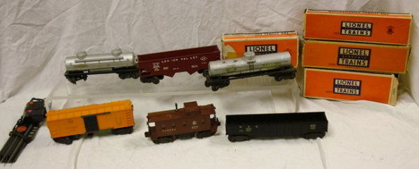 SEVEN LIONEL FREIGHT CARS WITH #6555 W/BOX, 6566 W: SEVEN LIONEL FREIGHT CARS WITH #6555 W/BOX, 6566 W/BOX, 6565 W/BO, 6557, ETC