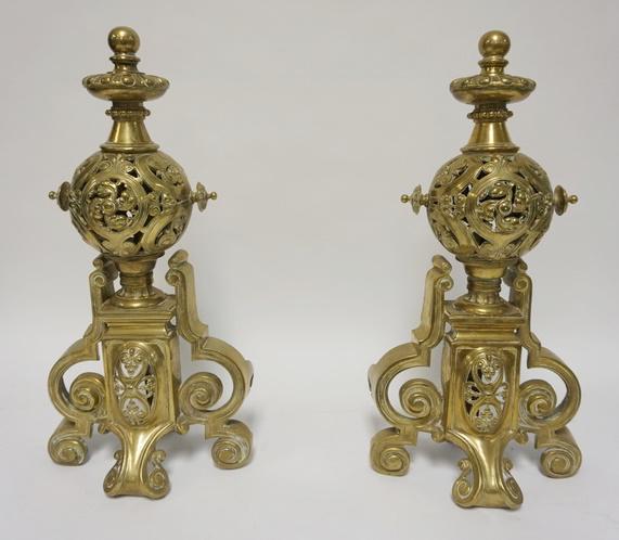 PAIR OF ORNATE BRASS CHENETS: PAIR OF ORNATE BRASS CHENETS, 19 IN HIGH