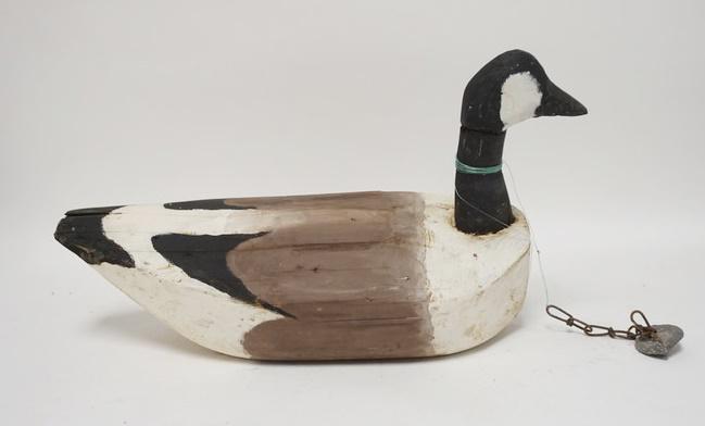 LARGE CARVED WOODEN GOOSE DECOY W/ WEIGHT: LARGE CARVED WOODEN GOOSE DECOY W/ WEIGHT SIGNED SPP 23 IN L