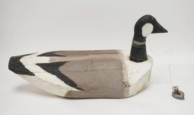 LARGE CARVED WOODEN GOOSE DECOY W/ WEIGHT: LARGE CARVED WOODEN GOOSE DECOY W/ WEIGHT SIGNED SPP 23 IN L