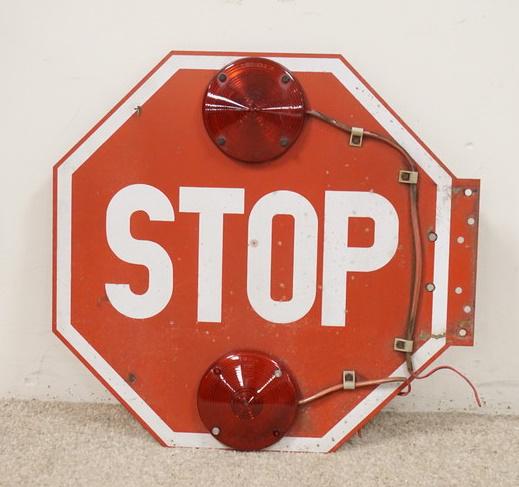 2 SIDED STOP SIGN W/ LIGHTS: TWO SIDED STOP SIGN W/ RED LIGHTS ONE SIDE HAS SOME RUST. 18 IN
