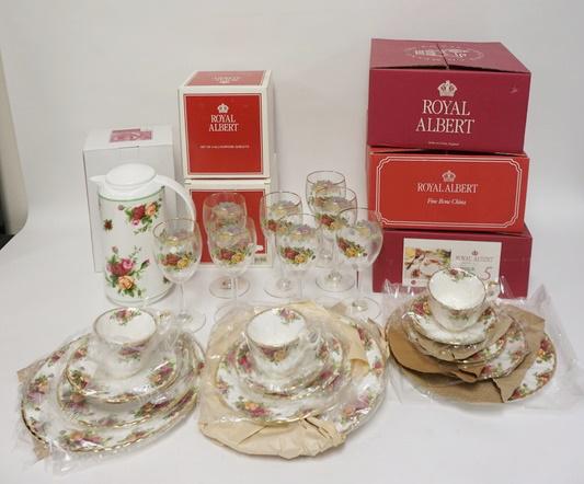 24 PIECE ROYAL ALBERT *OLD COUNTRY ROSES*: 24 PIECE ROYAL ALBERT *OLD COUNTRY ROSES*, THREE 5 PIECE PLACE SETTINGS, 8 GLASS GOBLETS & A PLASTIC JUG 10 IN HIGH, ALL IN ORIGINAL BOXES