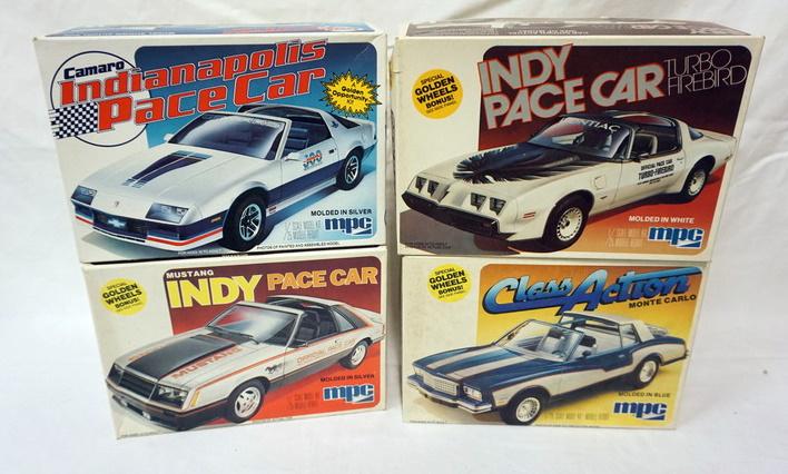 4 MPC MODEL CAR KITS: LOT OF 4 MPC MODEL CAR KITS, CAMARO, MUSTANG, MONTE CARLO, INDY PACE CAR, KITS ARE POSSIBLY COMPLETE, NOT GUARANTEED