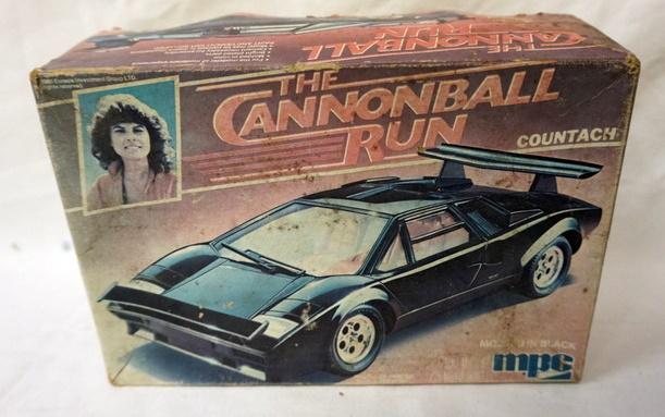 MPC MODEL CAR KIT CANNONBALL RUN: MPC MODEL CAR KIT, CANNONBALL RUN, BOX IS WORN, KITS ARE POSSIBLY COMPLETE, NOT GUARANTEED