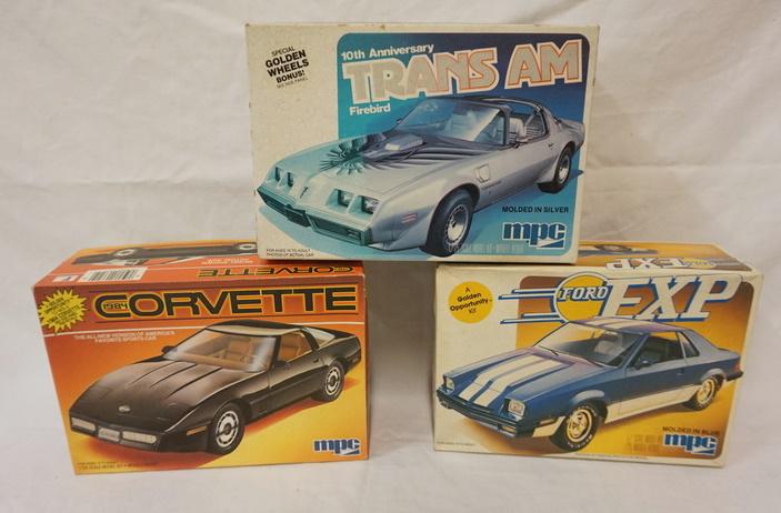 3 MPC MODEL CAR KITS: LOT OF 3 MPC MODEL CAR KITS, CORVETTE, FORD EXP, TRANS AM, KITS ARE POSSIBLY COMPLETE, NOT GUARANTEED