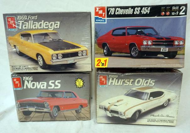 4 AMT ERTL MODEL CAR KITS: LOT OF 4 AMT ERTL MODEL CAR KITS. SEALED