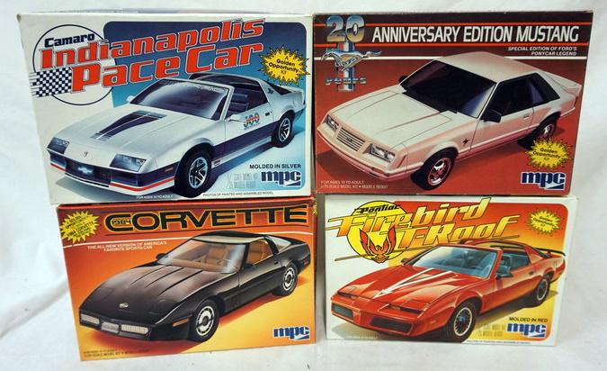 4 MPC MODEL CAR KITS: MPC LOT OF 4 MODEL CAR KITS. KITS ARE POSSIBLY COMPLETE, NOT GUARANTEED