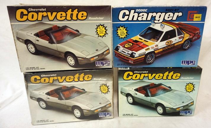4 MPC MODEL CAR KITS: MPC LOT OF 4 MODEL CAR KITS. KITS ARE POSSIBLY COMPLETE, NOT GUARANTEED. 1 SEALED