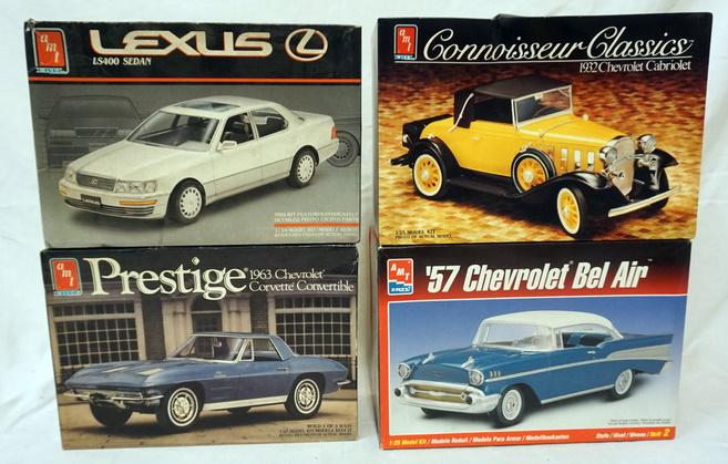 4 AMT ERTLE MODEL CAR KITS: LOT OF 4 AMT ERTL MODEL CAR KITS. KITS ARE POSIBLY COMPLETE, NOT GUARANTEED.