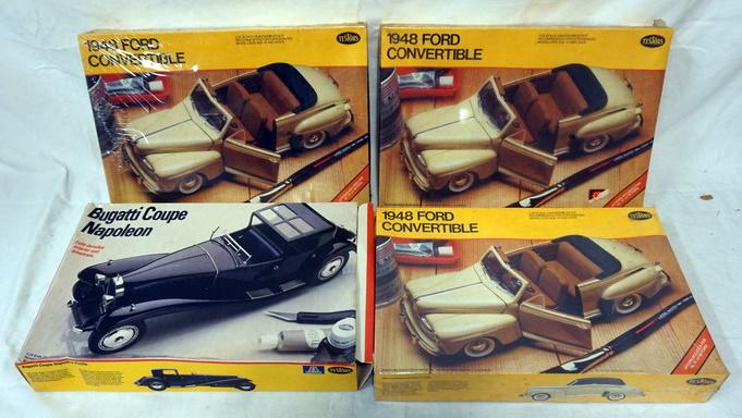 4 TESTER MODEL CAR KITS, 3 SEALED: LOT OF 4 MODEL CAR KITS, 3 SEALED. KITS ARE POSIBLY COMPLETE, NOT GUARENTEED