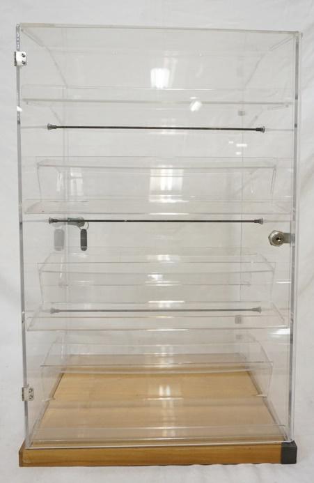 MULTI TIER PLASTIC DISPLAY CASE: MULTI TIER PLASTIC DISPLAY CASE W/ LOCKING DOOR & KEY. 25 IN X 15 1/4 IN W 13 1/2 IN DEEP