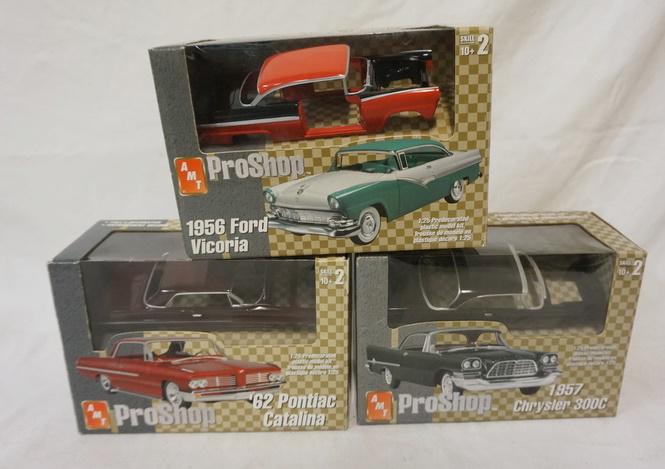 LOT OF 3 AMT PRO SHOP MODEL KITS: LOT OF THREE AMT PRO SHOP MODEL CAR KITS. POSSIBLY COMPLETE NOT GUARANTEED