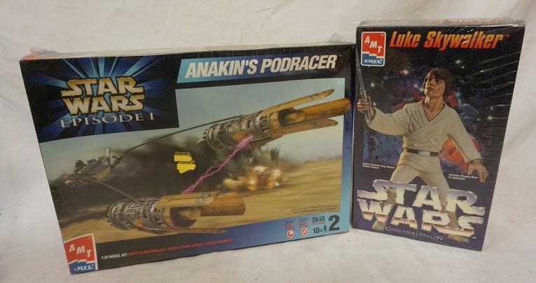 LOT OF 2 AMT ERTL STAR WARS MODEL KITS SEALED IN BOX: LOT OF TWO AMT ERTL STAR WARS MODEL KITS BOTH ARE SEALED IN BOX ONE IS ANAKIN'S PODRACER, THE OTHER IS LUKE SKYWALKER