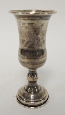 STERLING SILVER KIDDISH CUP W/ENGRAVED DECORATIONS: STERLING SILVER KIDDISH CUP W/ENGRAVED DECORATIONS, HAS STAR OF DAVID, ETC, 4 1/4 IN HIGH, 1.37 TOZ